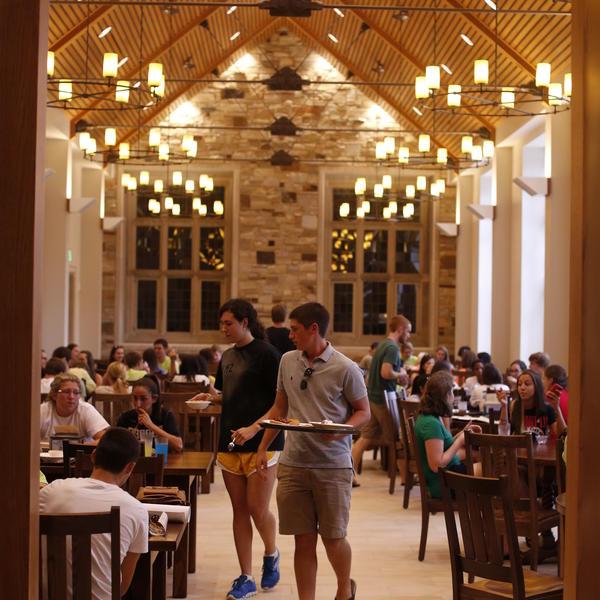 students in a large dining hall